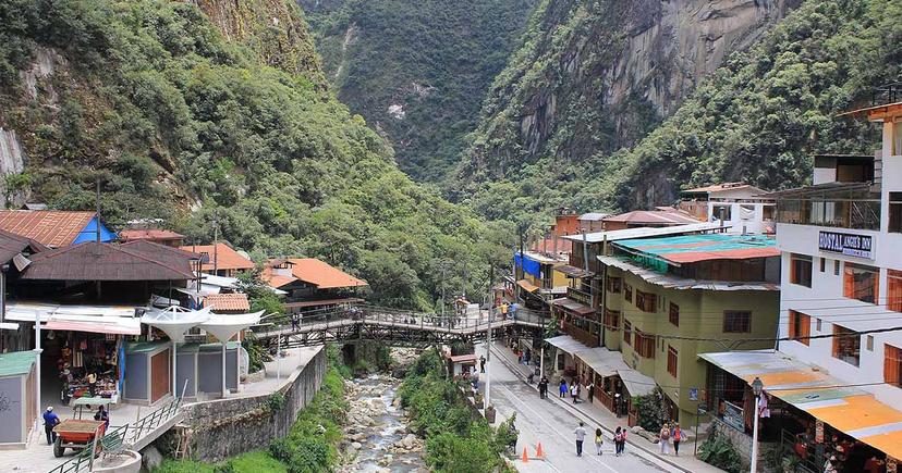 <div class="entry-thumb-caption">The town of Aguas Calientes is abuzz with travelers excited to visit Machu Picchu. Image: <a href="https://commons.wikimedia.org/wiki/File:Machu_Picchu,_Peru_-_Laslovarga_(262).jpg" rel="noopener noreferrer" onclick="javascript:window.open('https://commons.wikimedia.org/wiki/File:Machu_Picchu,_Peru_-_Laslovarga_(262).jpg'); return false;">Machu Picchu, Peru - Laslovarga (262) </a> by <a href="https://commons.wikimedia.org/wiki/User:Laslovarga" rel="noopener noreferrer" onclick="javascript:window.open('https://commons.wikimedia.org/wiki/User:Laslovarga'); return false;">Laslovarga</a>, used under <a href="https://creativecommons.org/licenses/by-sa/4.0/deed.en" rel="noopener noreferrer" onclick="javascript:window.open('https://creativecommons.org/licenses/by-sa/4.0/deed.en'); return false;">CC BY-SA 4.0</a> / Cropped and compressed from original.</div>