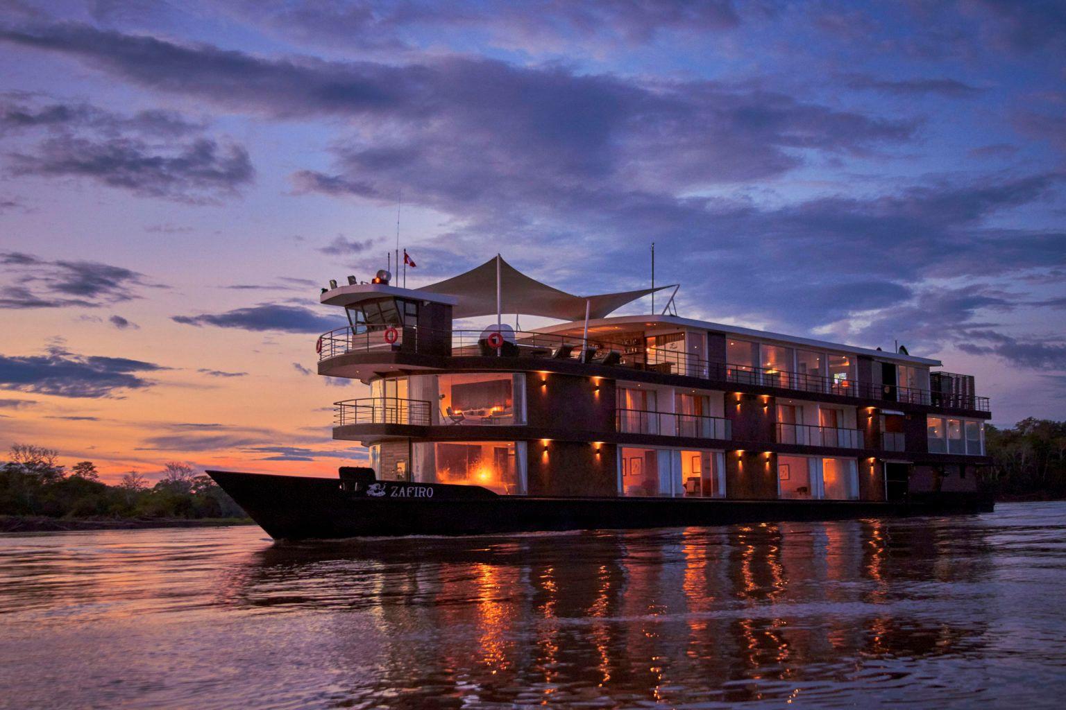 Witness spectacular sunsets in the heart of the Amazon, all while aboard your luxury Amazon cruise. Photo by Jungle Experiences