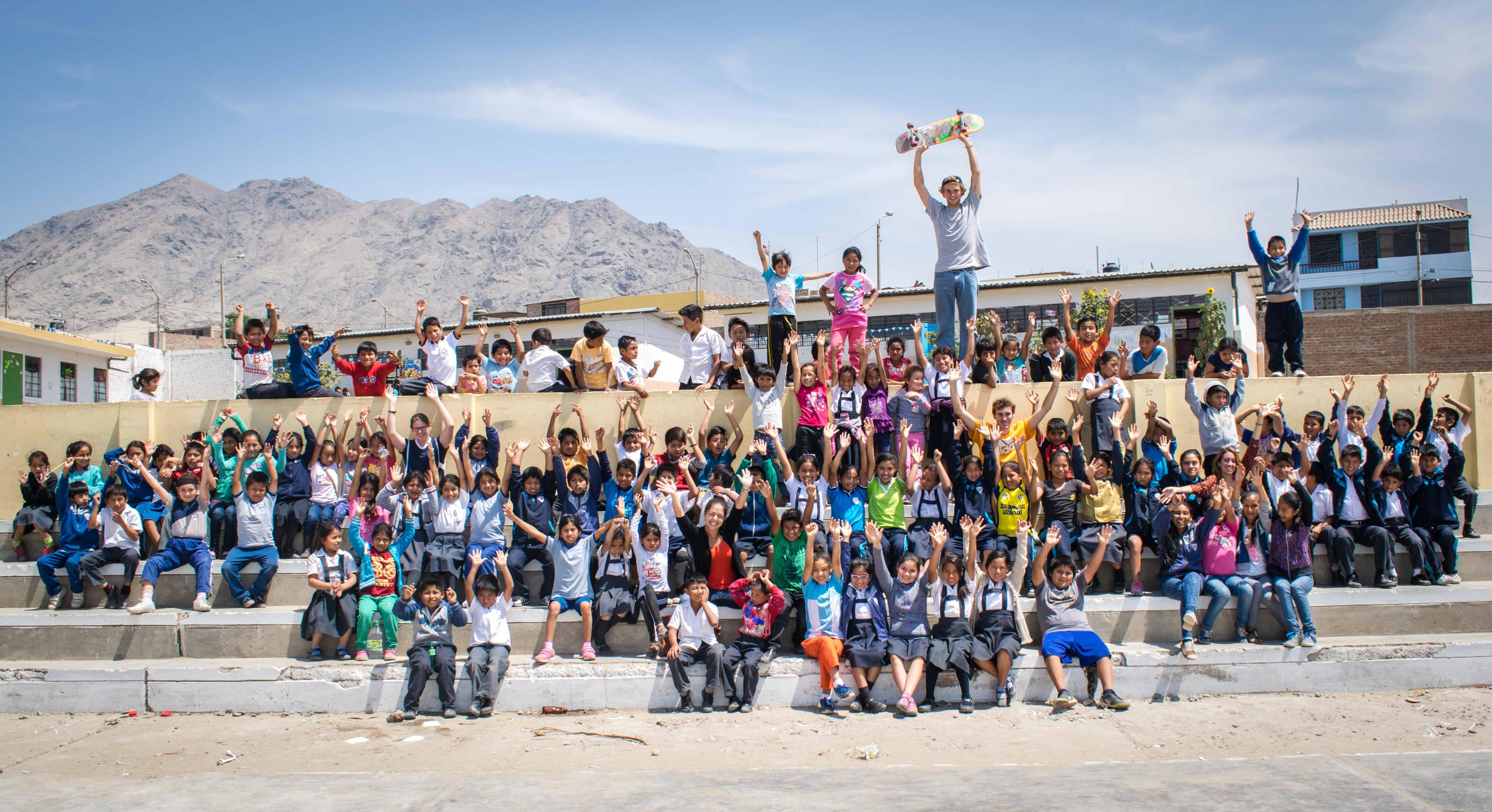 Kids posing at a Concrete Jungle Foundation project.