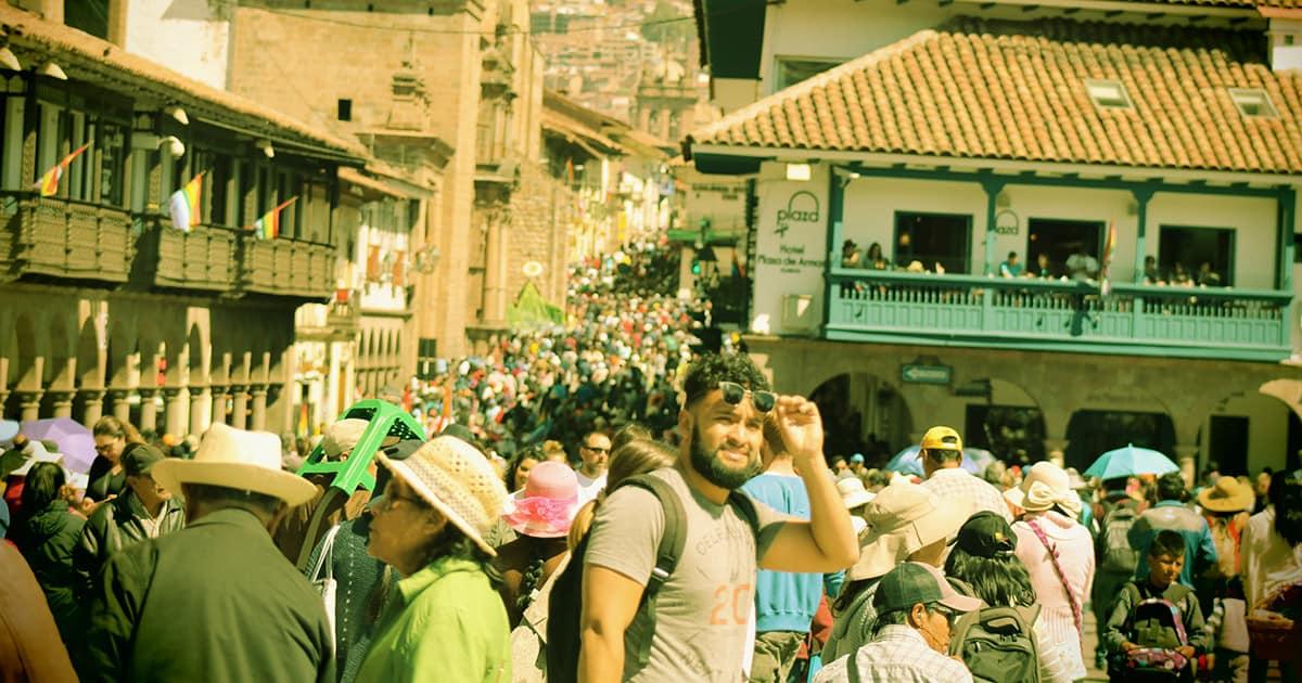 A tourist in Cusco. Photo by Renny Gamarra on Unsplash.