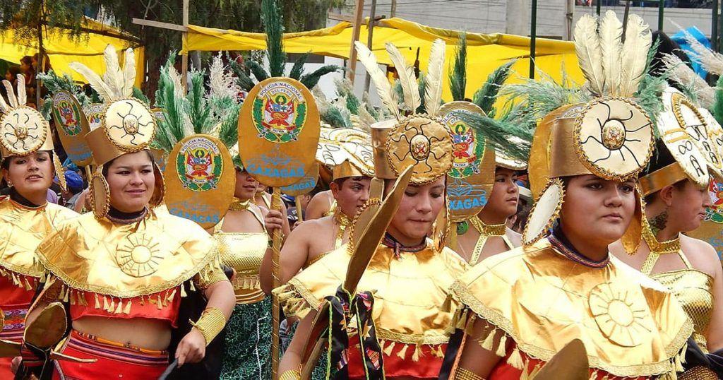 Costumed performers at carnival in Cajamarca. Image by manuel chavez from Pixabay.