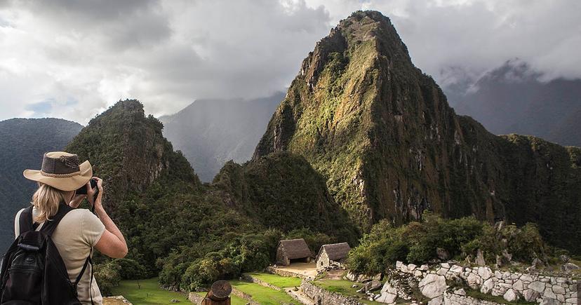 <div class="entry-thumb-caption">A tourist takes photos of Machu Picchu.</div>