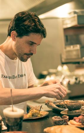 Virgilio finishing a dish