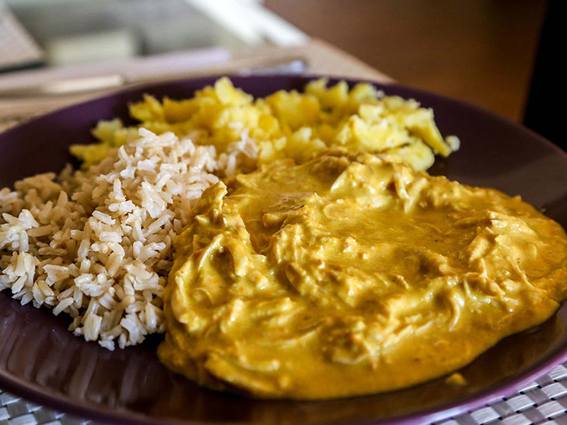 Popular Peruvian dish, aji de gallina, served with white rice.