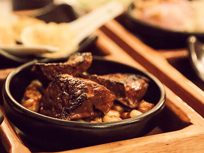 A plate of anticuchos at Huaca Pucllana.