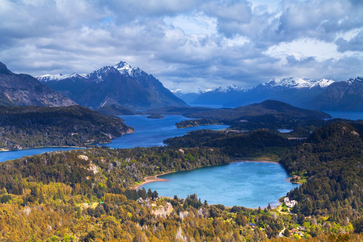 Lakes with snow-capped mountains in the background in Nahuei Huapi National Park, Argentina.