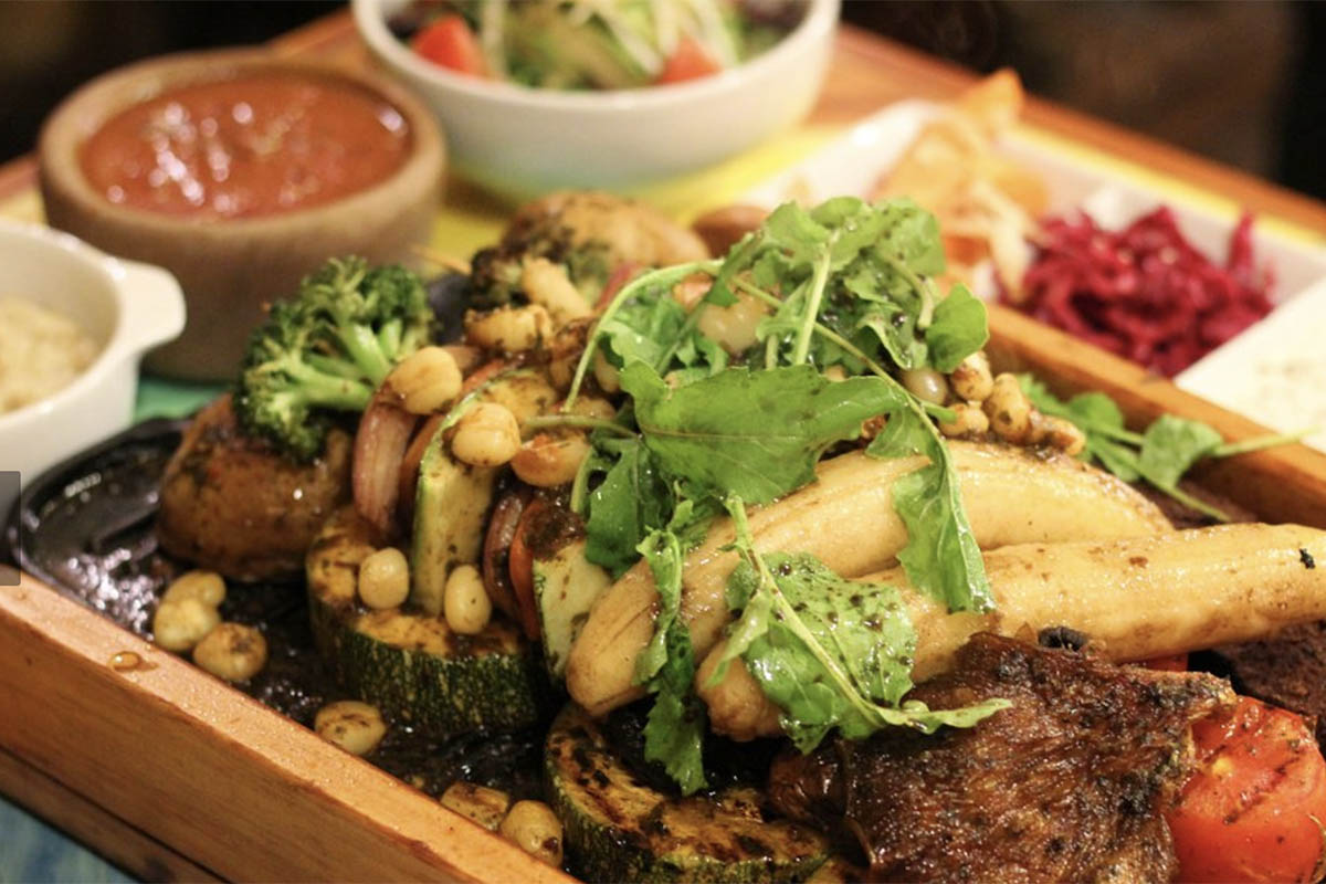 A close up of a platter of vegetarian food in Cusco, Peru..