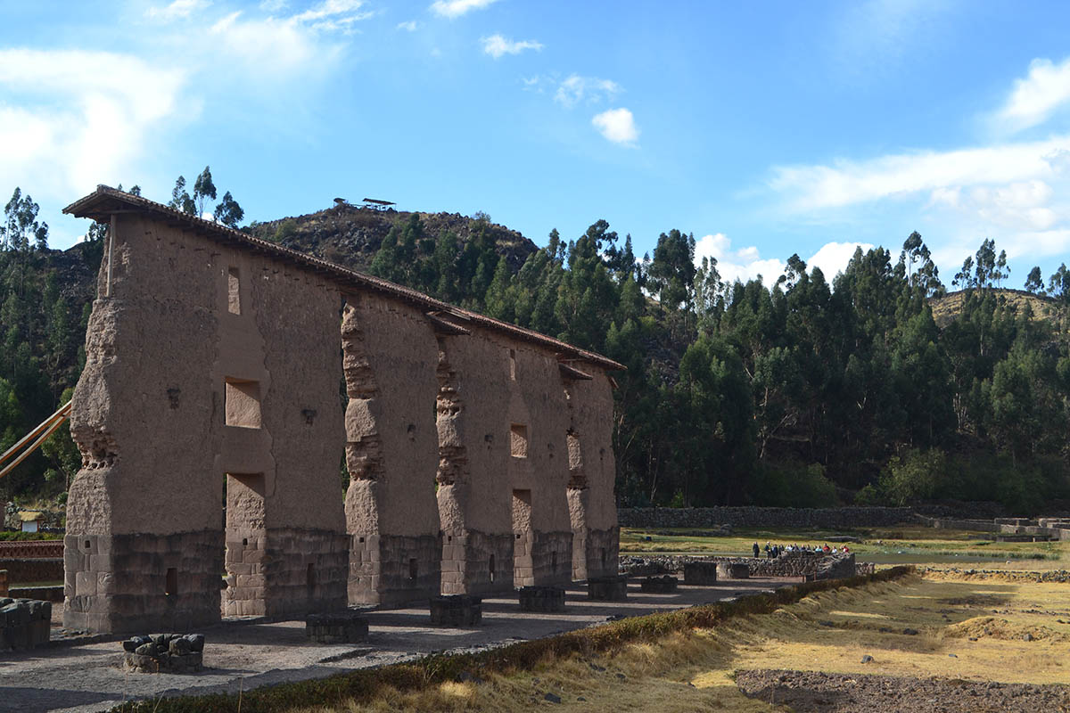 Raqchi ruins with blue sky in the background