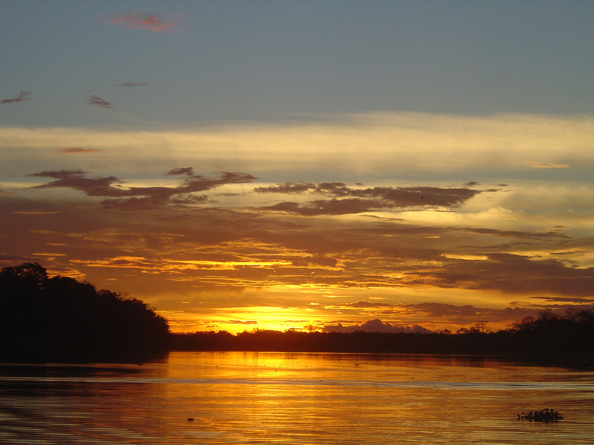 A sunset over the Amazon River in Iquitos, Peru
