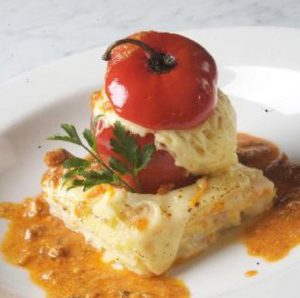 A close up of a cheesy rocoto relleno, a classic Arequipa food