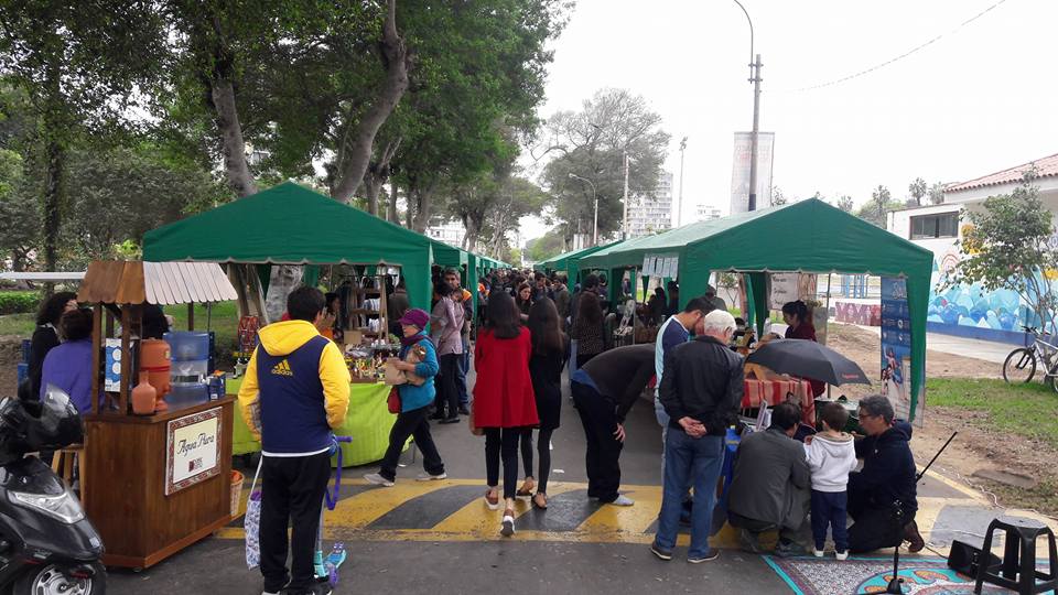 The Barranco farmer's market, consisting of tables lining the streets with green awnings.