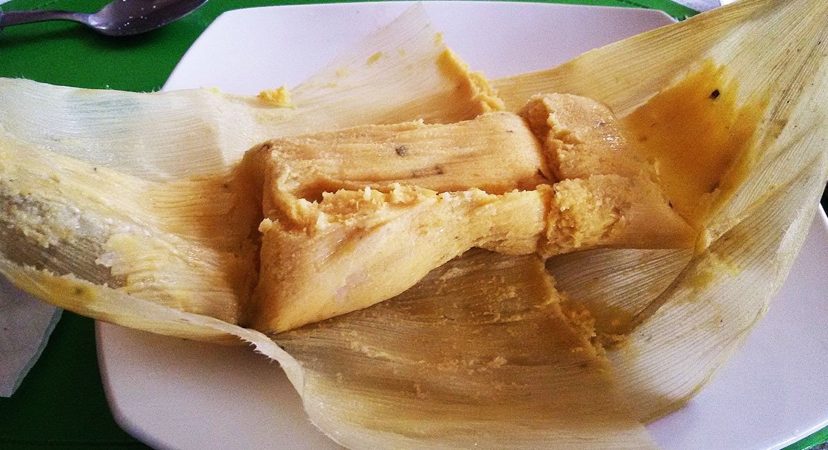 Humita, a fresh, ground corn dish similar to a tamal.