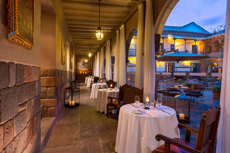 A romantic table setting in the outdoor courtyard at the Palacio del Inka hotel in Cusco.