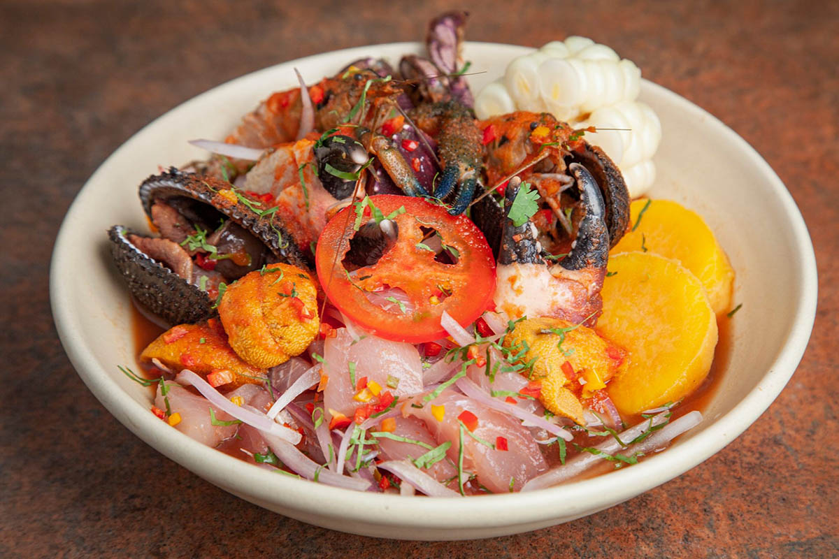 A plate of ceviche with several different fish and seafood at Lar Mar in Lima.