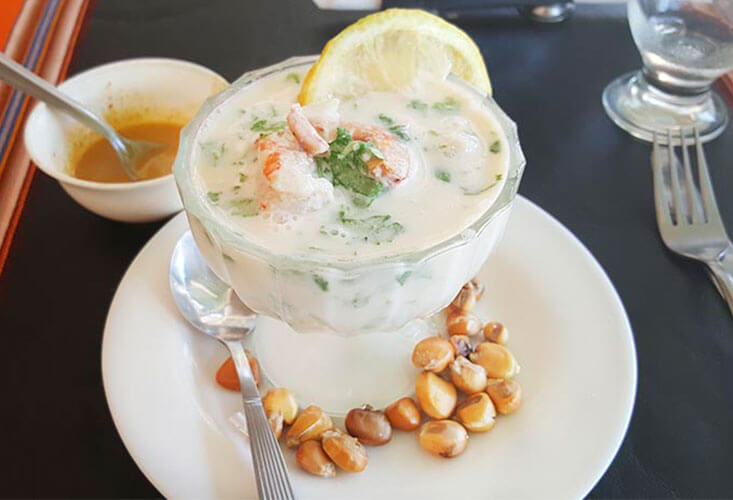 a bowl of leche de tigre, a Peruvian culinary specialty