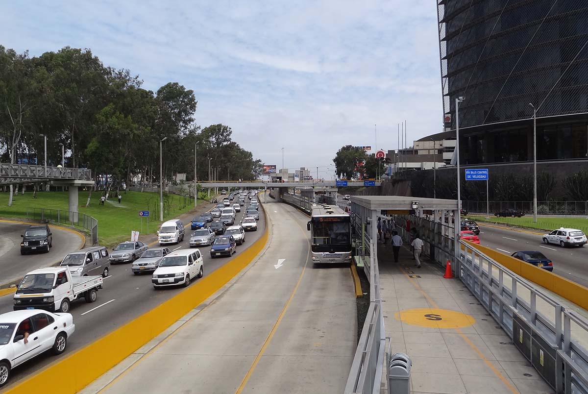 Car and bus lanes of traffic along the Via Expresa highway in Lima.