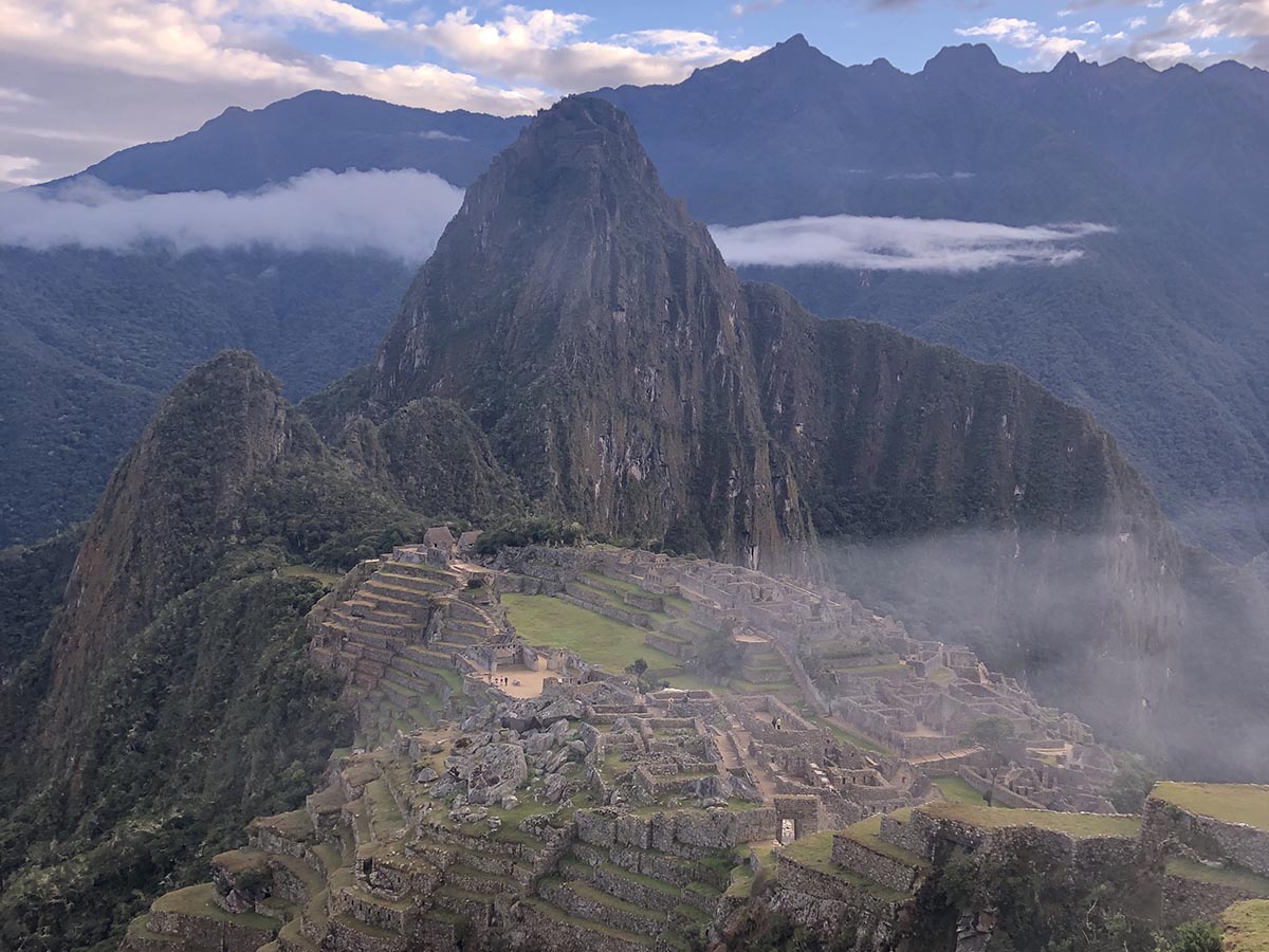 Birds eye view of Machu Picchu on a cloudy day.
