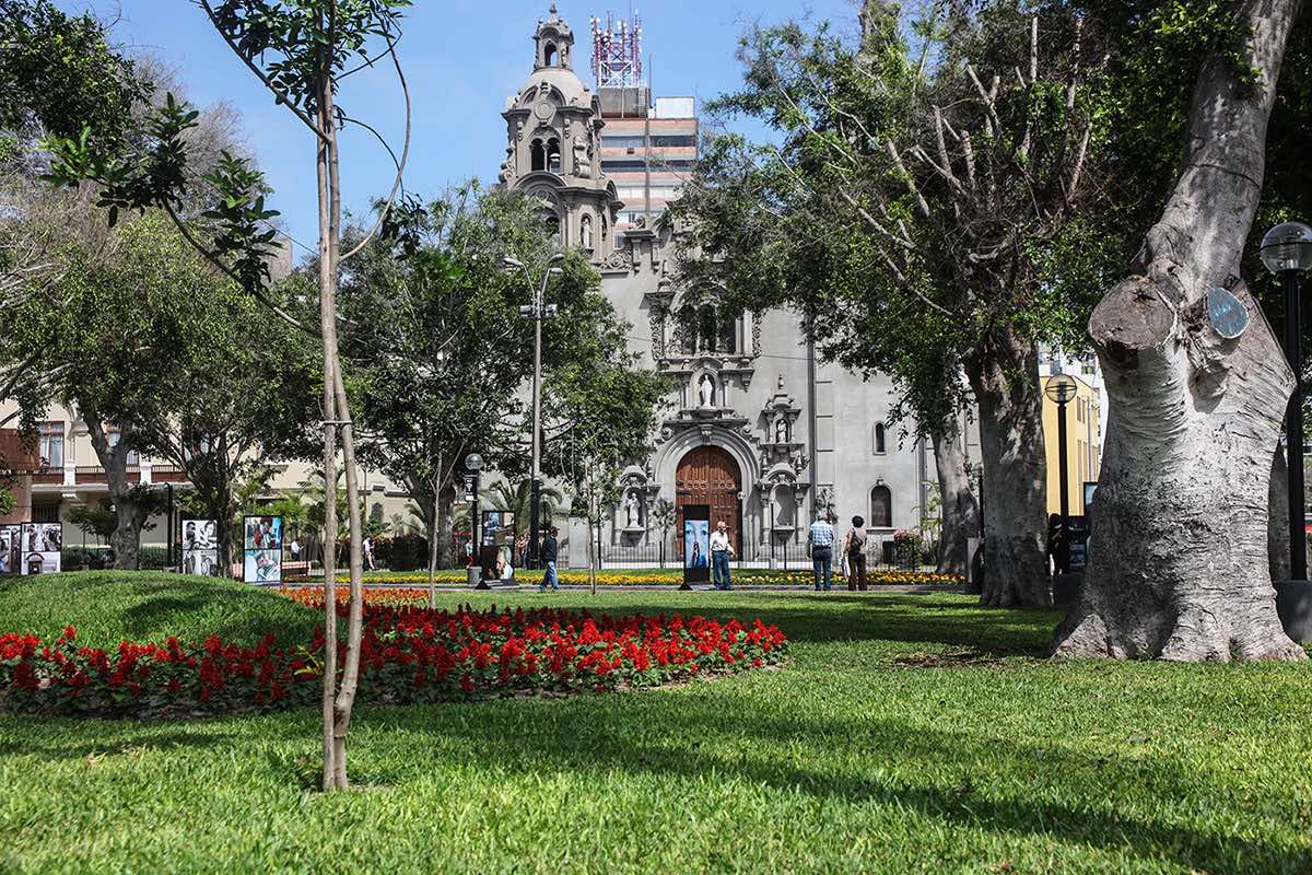 At the bottom of the Parque Kennedy is a stone church. The church itself has beautiful architecture. Before the church is green space and flowers