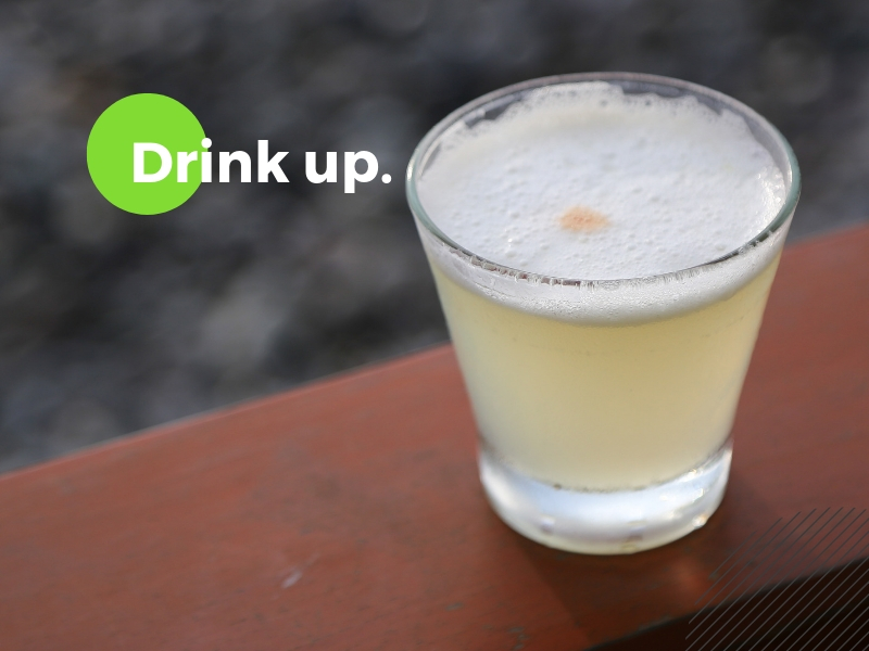 A fresh pisco sour, Peru's national drink made from pisco, lime juice, sugar, egg white and bitters.