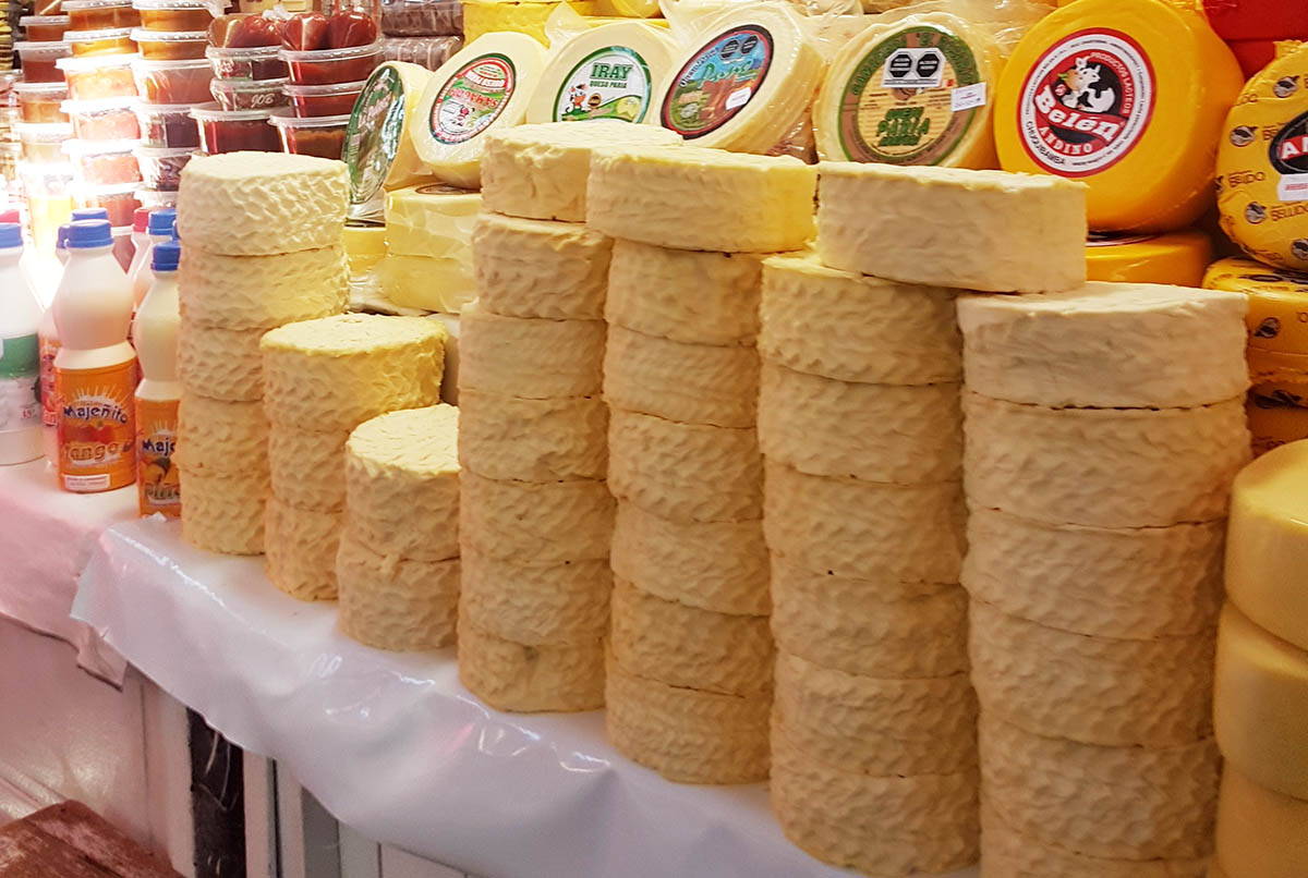 Stacks of queso fresco, or fresh cheese, sold in a Peruvian market.