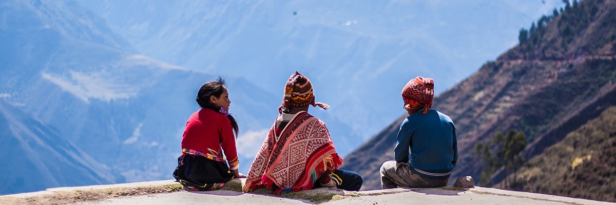 Native kids looking out over the Sacred Valley in Peru