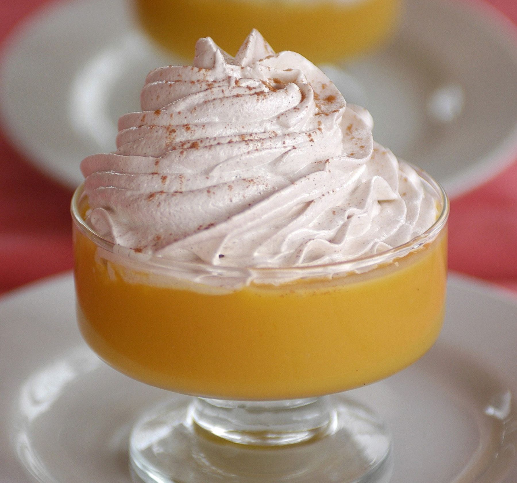 Photo of a Peruvian caramel custard-like dessert in a short stemmed dessert glass.